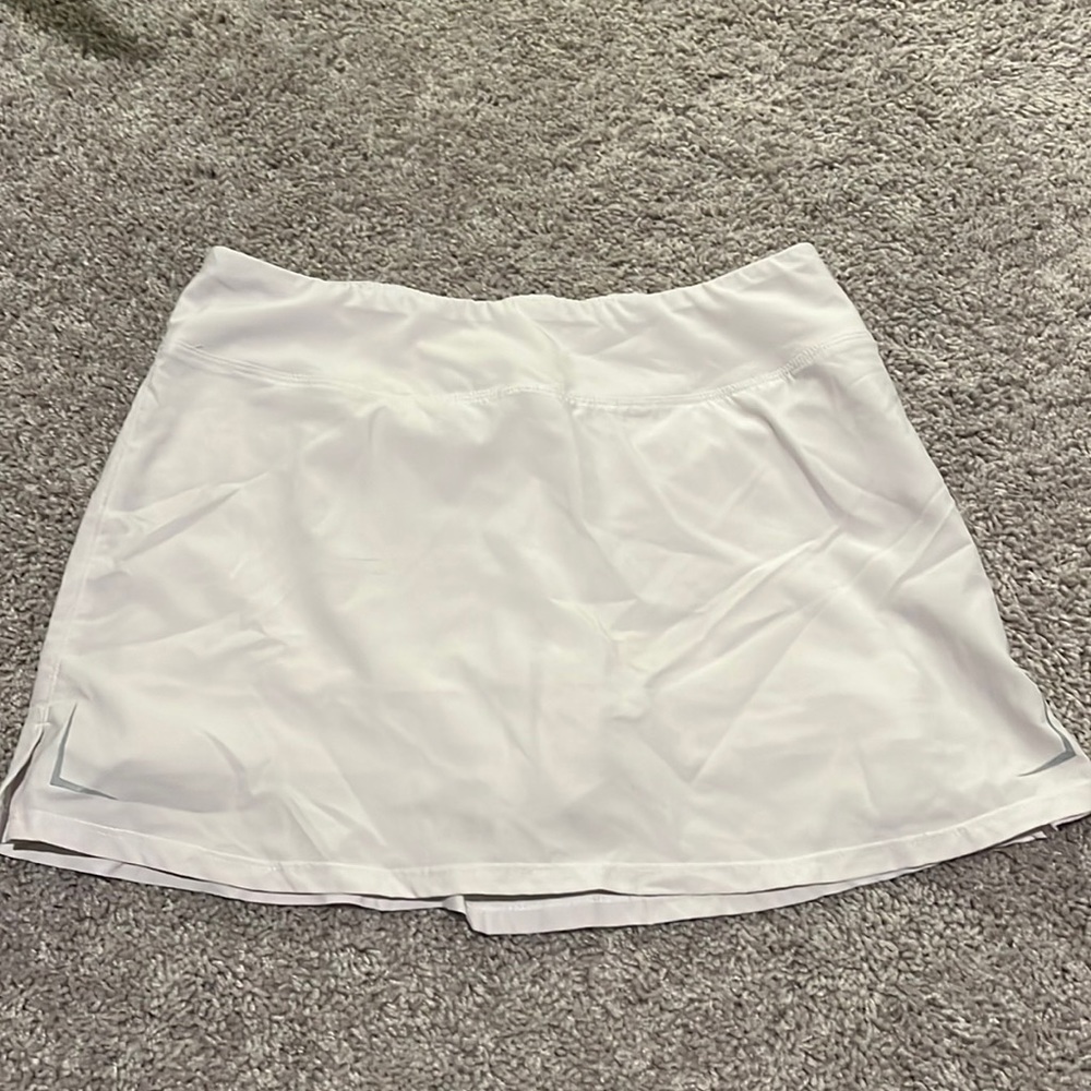 Women’s white golf skirt with built in shorts